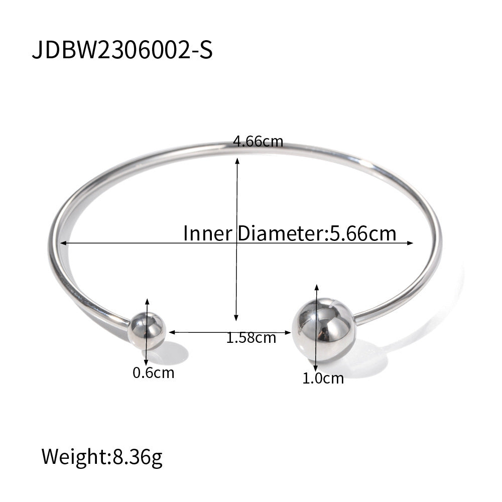 Bracciale sferico aperto con trama irregolare in acciaio inossidabile