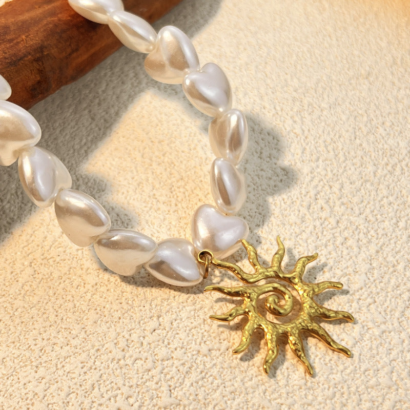 Collana irregolare con ciondolo sole vintage