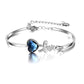 Bracciale rigido con cristalli blu dall'Austria Love Heart in argento sterling placcato oro bianco