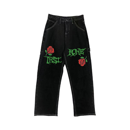 Jeans dritti con lavaggio stradale vintage con lettere rose