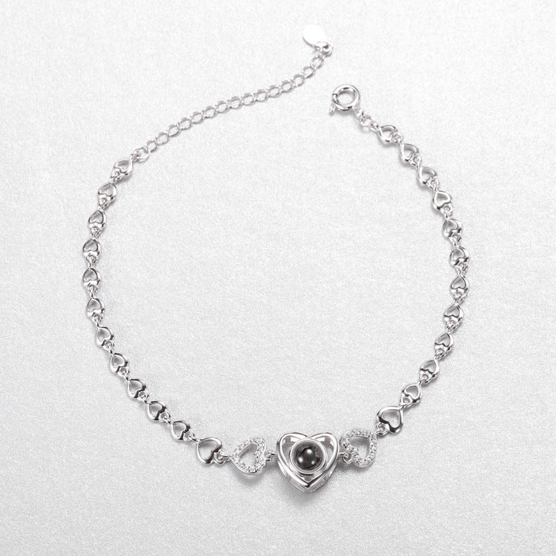 Capture a personalized touch by customizing your photo on a silver bracelet